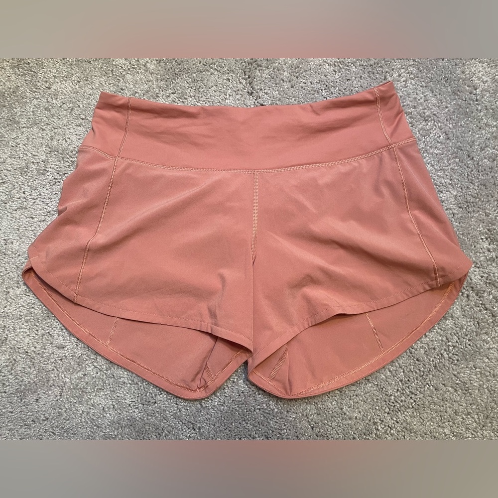 Lululemon 4 inch coral high rise speed up shorts size 6